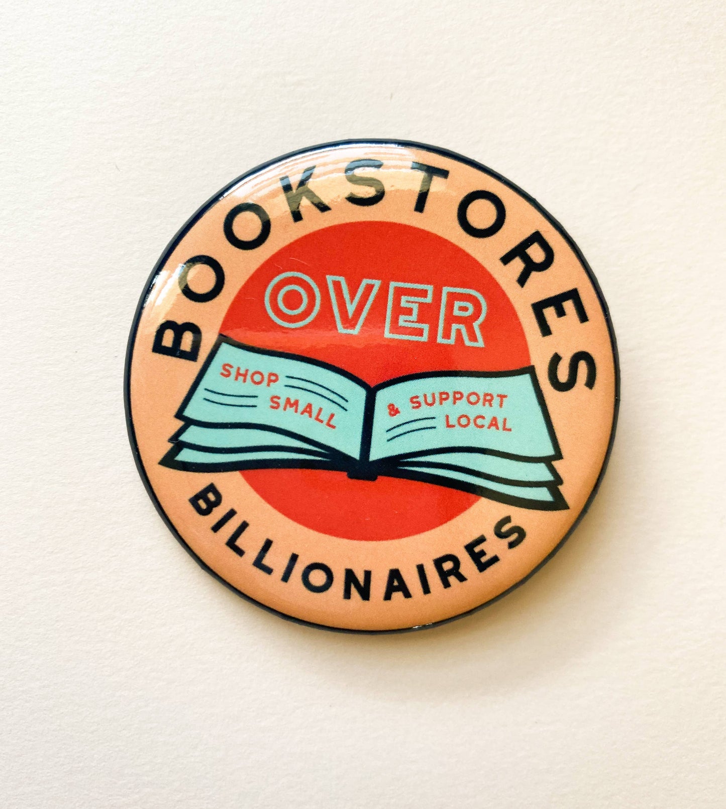 Bookstores over Billionaires Metal Pin
