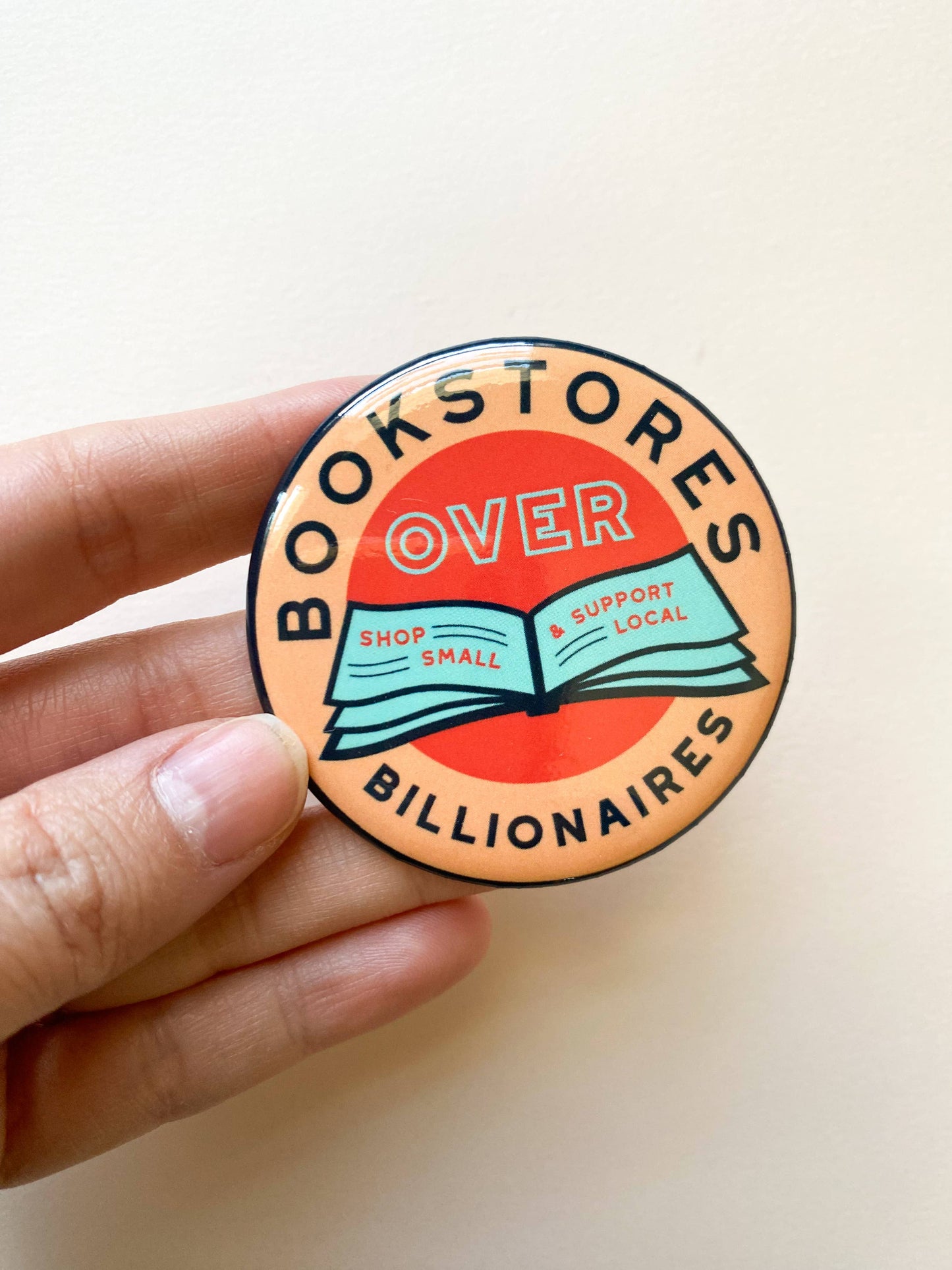 Bookstores over Billionaires Metal Pin